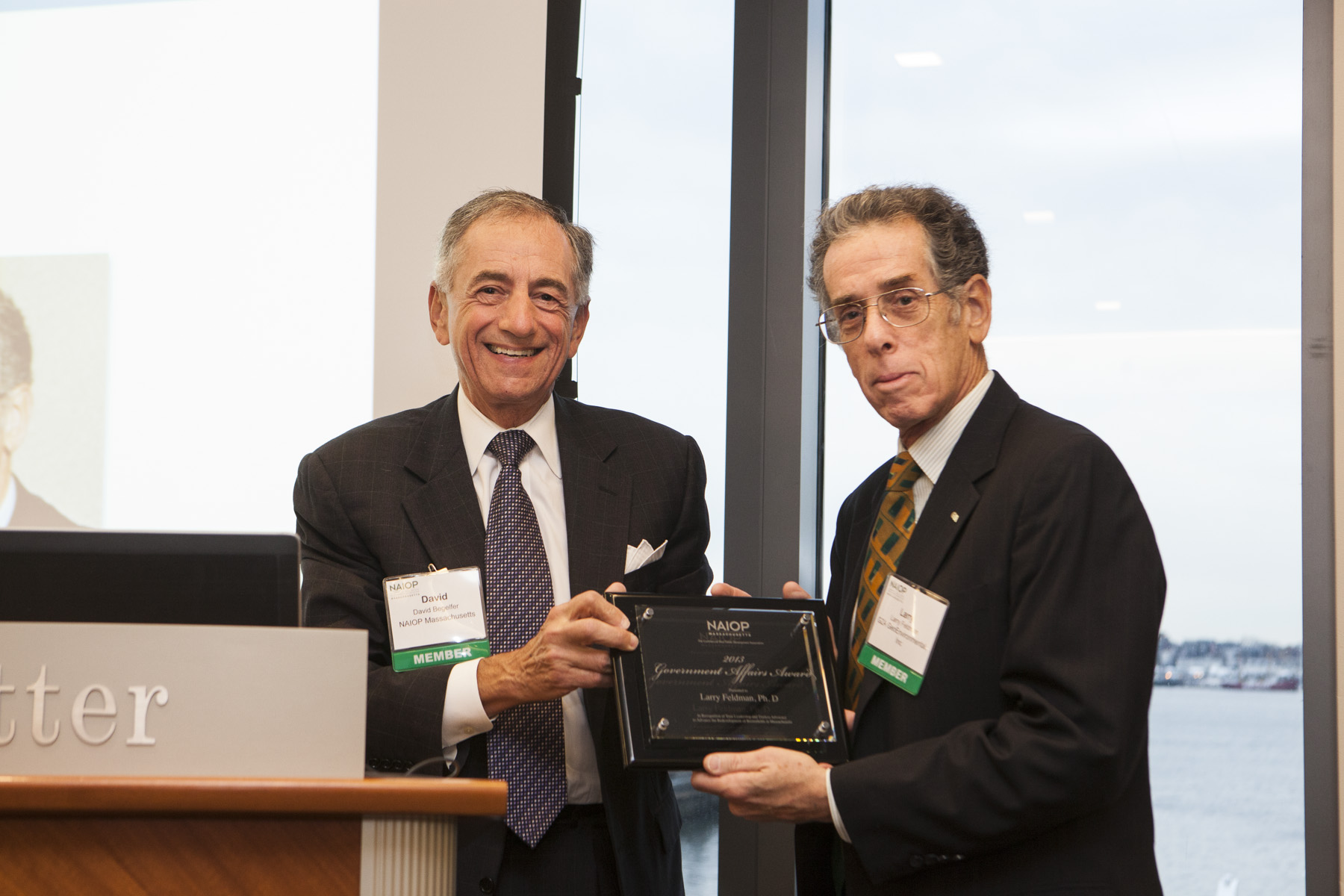David Begelfer, CEO of NAIOP MA presents award to Lawrence Feldman of GZA