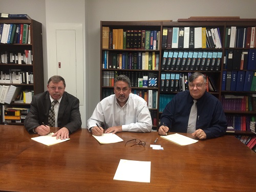 Left: Kenneth C. Tucker, lll (Director, CONN-OSHA Wethersfield, CT Office); Anthony Maselli (Vice President of Field Operations, KBE); and Robert W. Kowalski (Area Director, Bridgeport , CT Area OSHA Office). (PRNewsFoto/KBE Building Corporation)