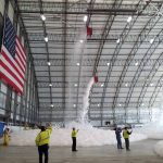 Stalker Electric performing a full discharge test of the foam fire suppression system at the Delta Hangar at Logan International with Massport fire and Delta representatives.
